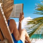 ‏‏Woman-reading-book-beach-091214-600x315 - עותק